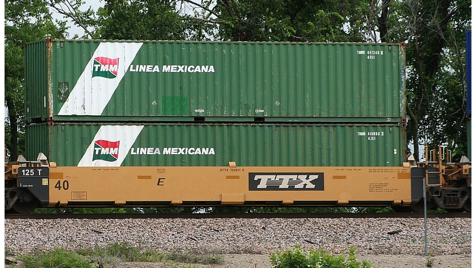 Shipping containers on a rail car