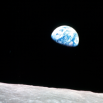 Earthrise over the lunar horizon (Apollo 8)