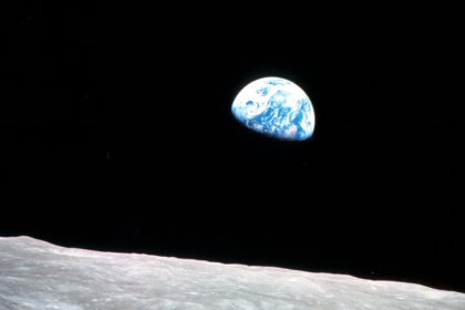 Earthrise over the lunar horizon (Apollo 8)